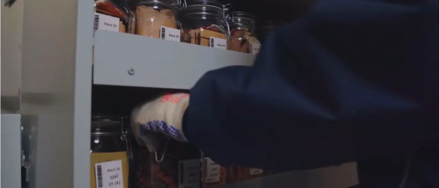 Close up of hand banking seeds at the Seeds banked at the Millenium Seed Bank