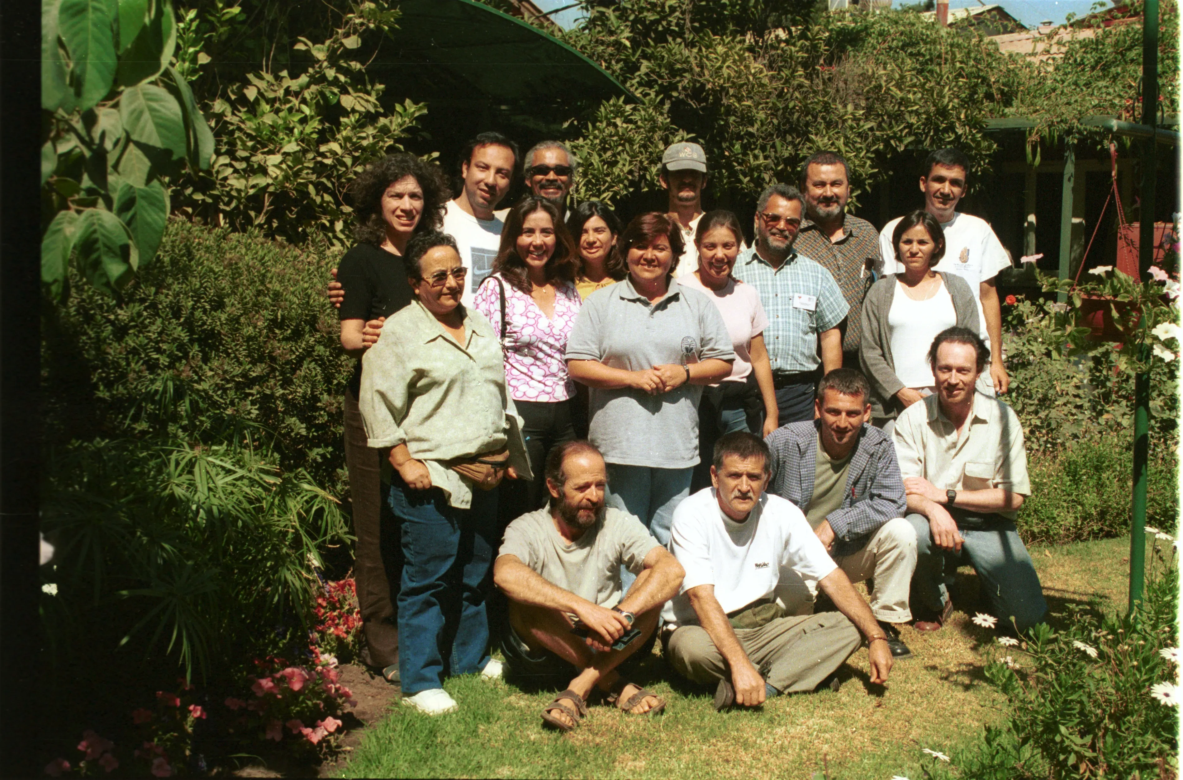 A group photo of MSB staff and partners in a garden in Chile