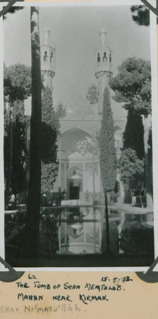 A black and white photograph of a tomb