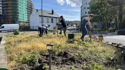 Working on Woodhead Rd planter 5th May as part of Grow Wild Community activities