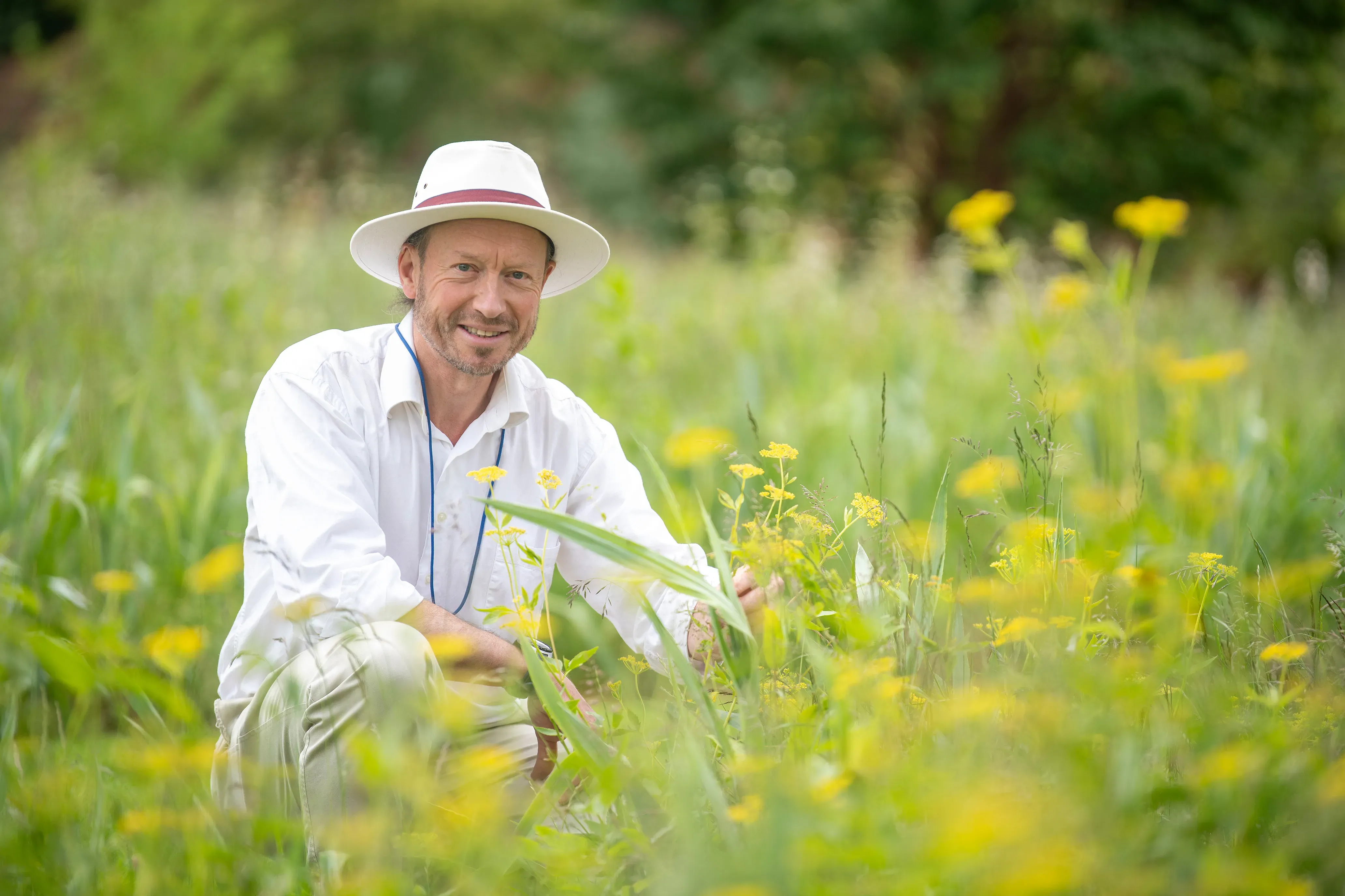 Michael Way amongst a sea of flowers at Wakehurst