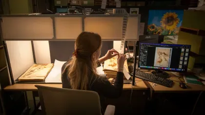 Woman digitises a plant specimen from Kew's Herbarium