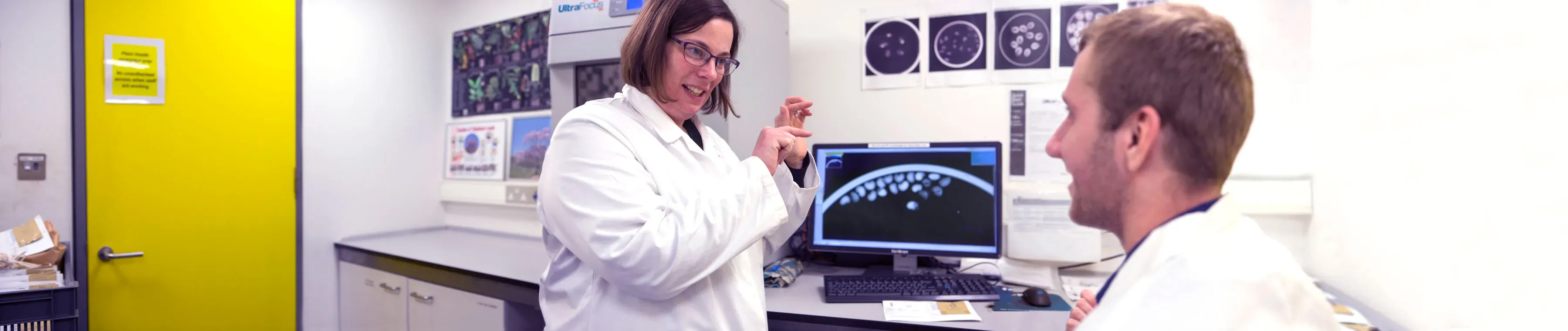 Two researchers in the x-ray room within the MSB