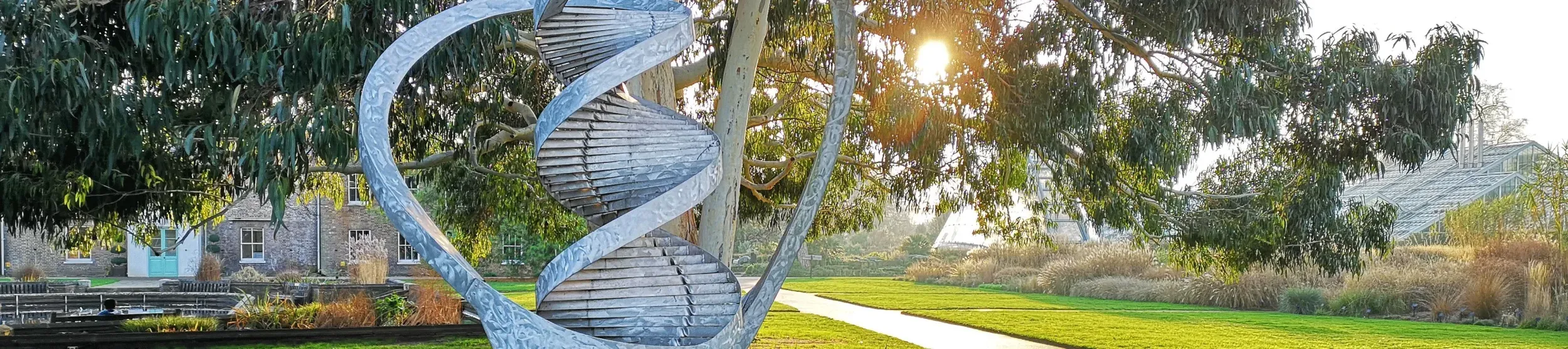 A metal DNA statue outside of the Jodrell Laboratory in Kew Gardens