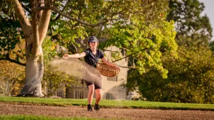 Sowing prairie seed by hand